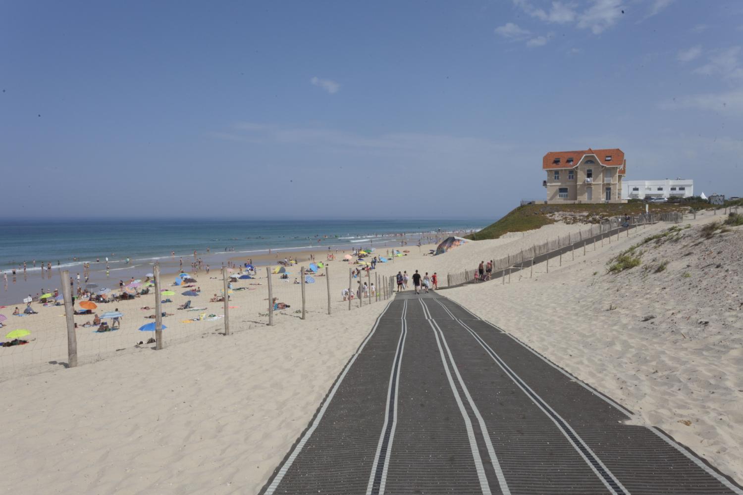 Descente à la plage sur tapis réversible